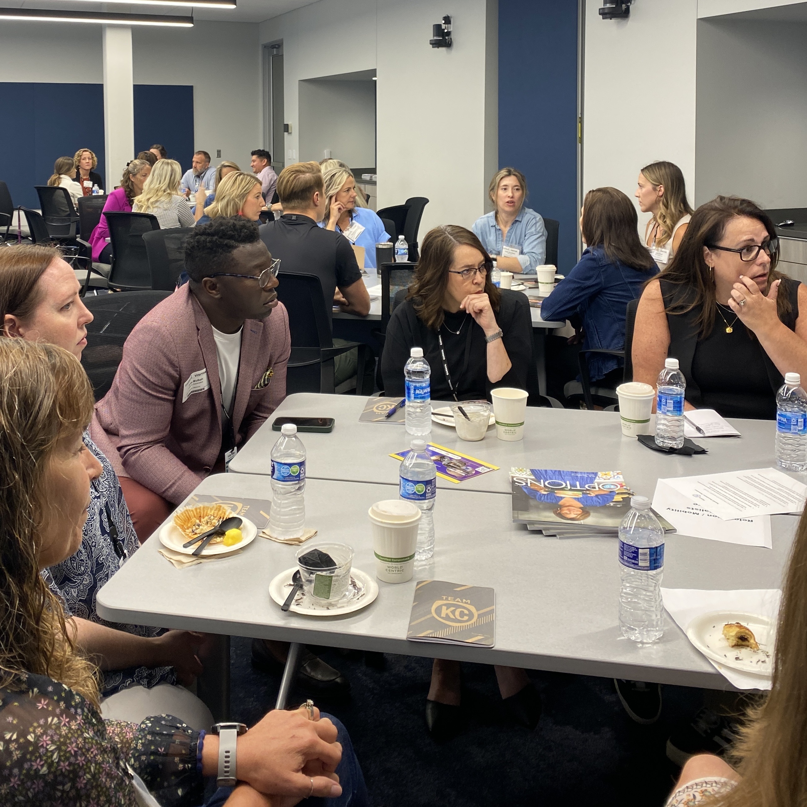 Participants of the June Roundtable sit and discuss relocation topics